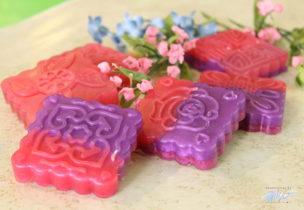 Floral handmade hand soap final products in purple and pink